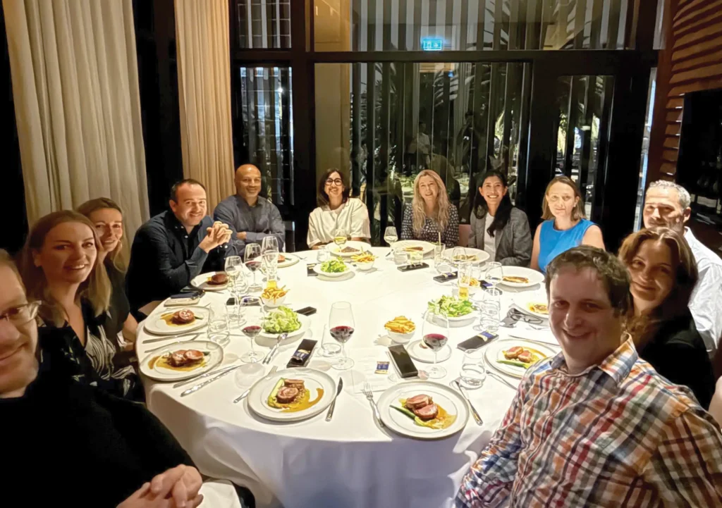 Legal leaders from the 2025 Melbourne Retreat catch up over dinner